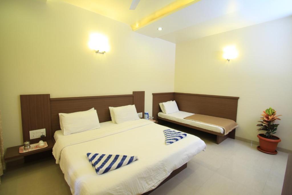 Hotel Sai Smaran Sirdi Szoba fotó