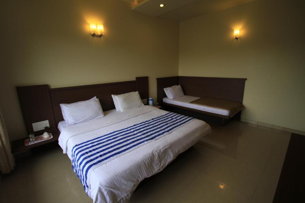 Hotel Sai Smaran Sirdi Szoba fotó