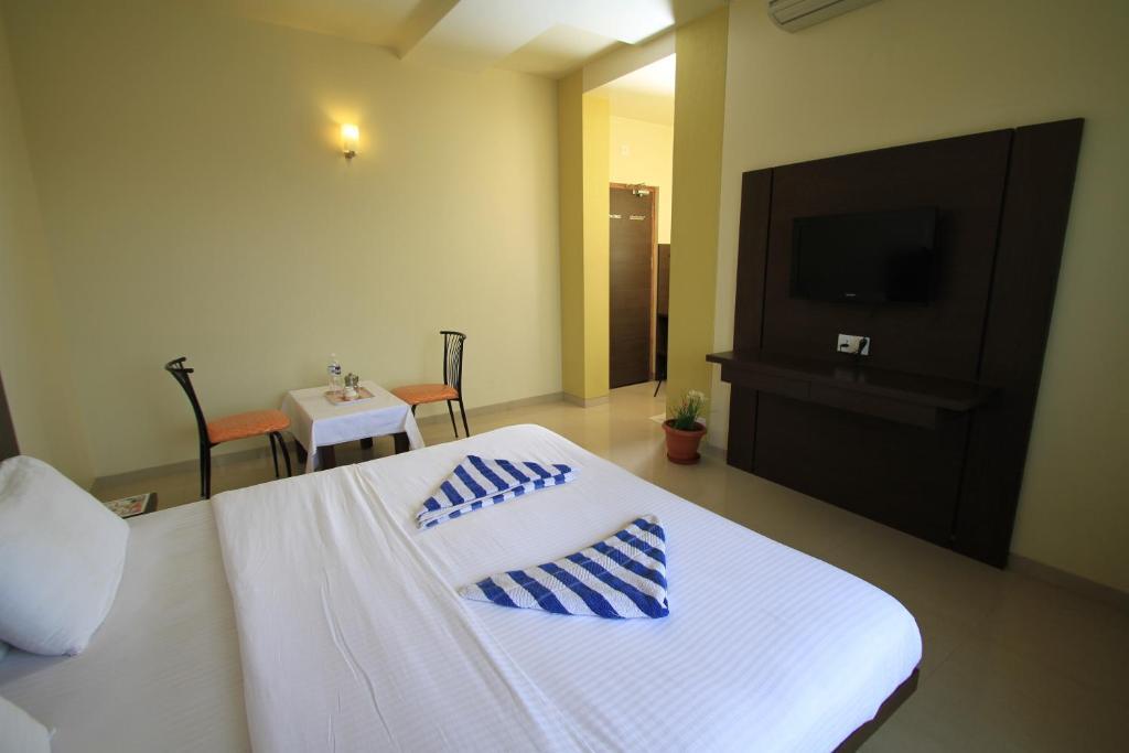 Hotel Sai Smaran Sirdi Szoba fotó